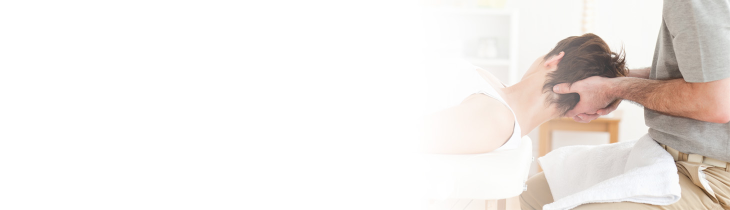 A DC adjusts a patient's neck.