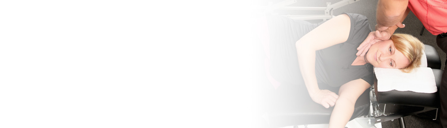 An employee at a chiropractic practice gets adjusted.