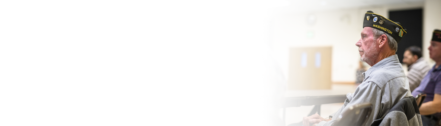 A chiropractor communicates with a veteran.