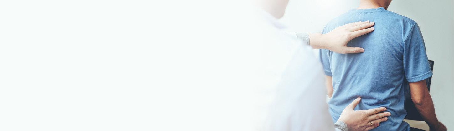 A DC adjusts a patient.